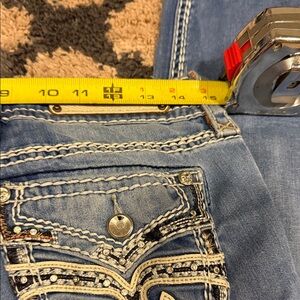 Rock Revival Light Blue Jeans with White Stitching